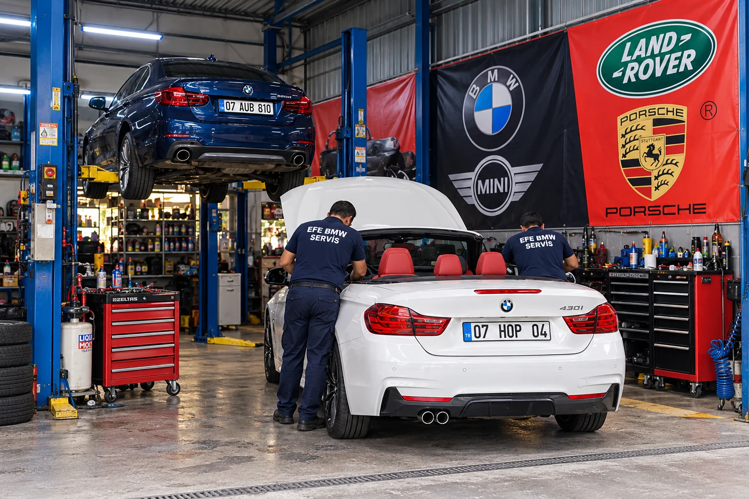 EFE BMW Özel Servis Kumluca atölyesinde BMW araç üzerinde çalışan ustalar
